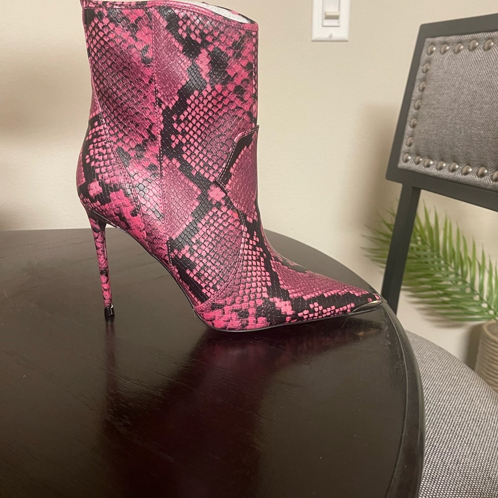 Steve Madden and Winnie Harlow snakeskin booties.